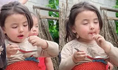 Vẻ thiên thần của em bé vùng cao khi mê mải ăn bún khiến dân mạng 'tan chảy'