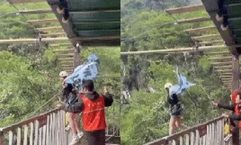 Clip: Cô gái rơi thẳng xuống vách núi do đứt dây cáp khi chơi trò mạo hiểm, trước đó liên tục nói “chưa buộc chặt”
