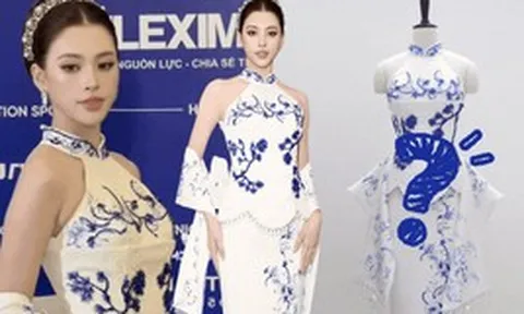 Hoa hậu Tiểu Vy hứng chỉ trích vì bộ váy hoạ tiết gốm xanh bị đánh giá "giống sườn xám Trung Quốc"