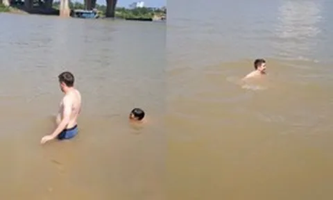 Anh Tây chịu thua cái nóng Hà Nội, đang cà phê 'chill' cũng xuống sông Đuống tắm