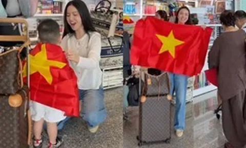 Chu Thanh Huyền khoác cờ Tổ quốc cho con trai, chiếm trọn spotlight tại sân bay khi sang Thái Lan cổ vũ Quang Hải và ĐT Việt Nam